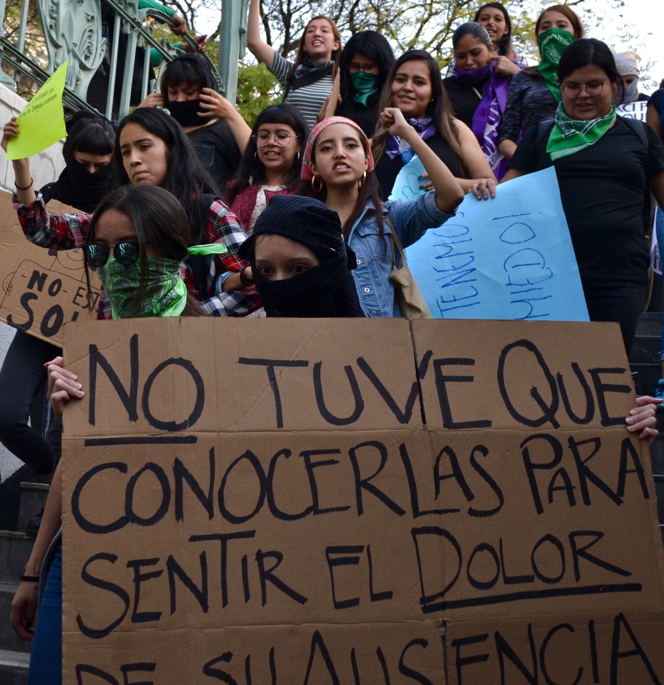 Feminist protestors enter the Bellas Artes metro station in downtown Mexico City Feb. 21, 2020.
